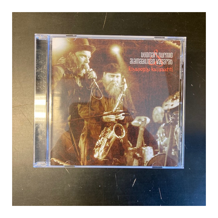Tuomari Nurmio & Alamaailman Vasarat - Kinaporin kalifaatti CD (VG+/VG+) -art rock-