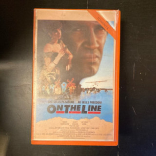 On The Line - rajalla VHS (VG+/VG+) -draama-