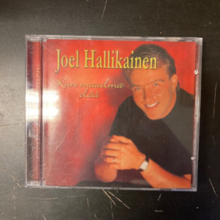 Joel Hallikainen - Kun maailma elää CD (M-/VG+) -iskelmä-