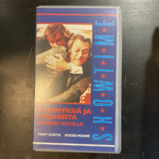 Pyhimyksiä ja veijareita - Konnat kovilla VHS (VG+/M-) -toiminta/komedia-