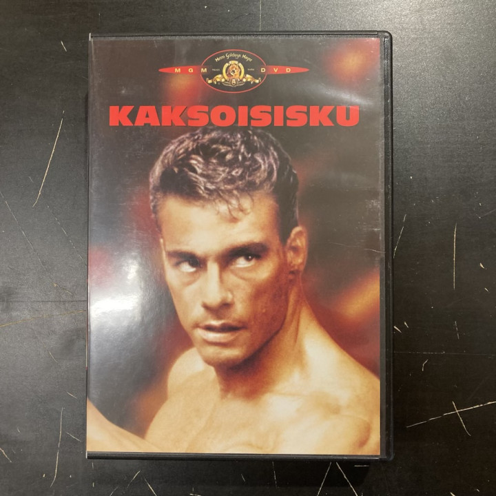 Kaksoisisku DVD (M-/M-) -toiminta-