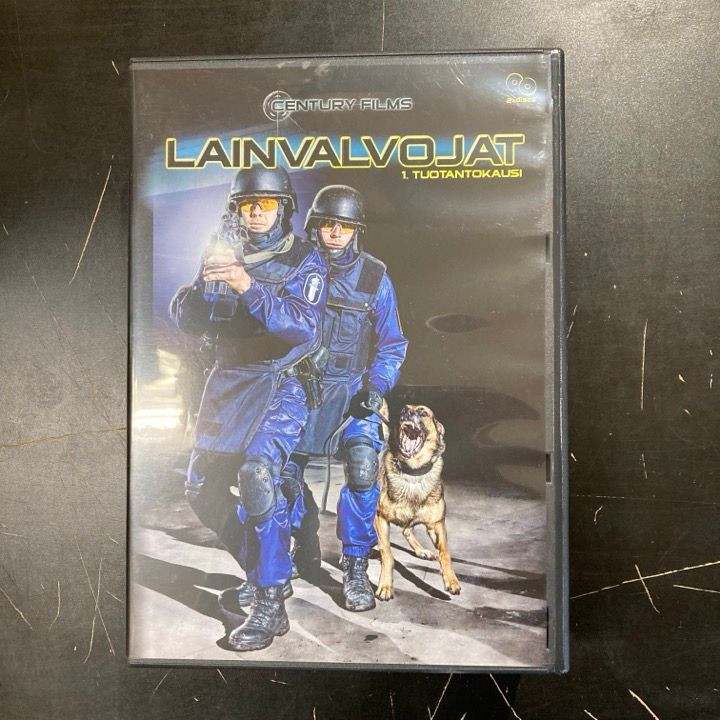 Lainvalvojat - Kausi 1 2DVD (VG+/M-) -tv-sarja-