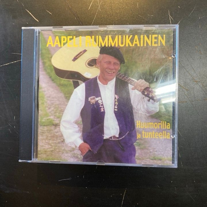 Aapeli Rummukainen - Huumorilla ja tunteella CD (VG/VG+) -kupletti-