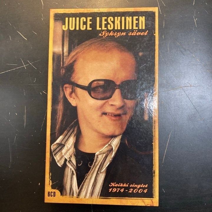 Juice Leskinen - Syksyn sävel (kaikki singlet 1974-2004) 6CD (VG-VG+/VG+) -pop rock-