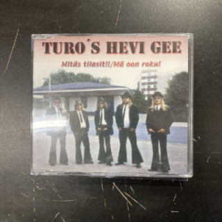 Turo's Hevi Gee - Mitäs tilasit!! / Mä oon roku! CDS (VG+/M-) -huumorimusiikki-